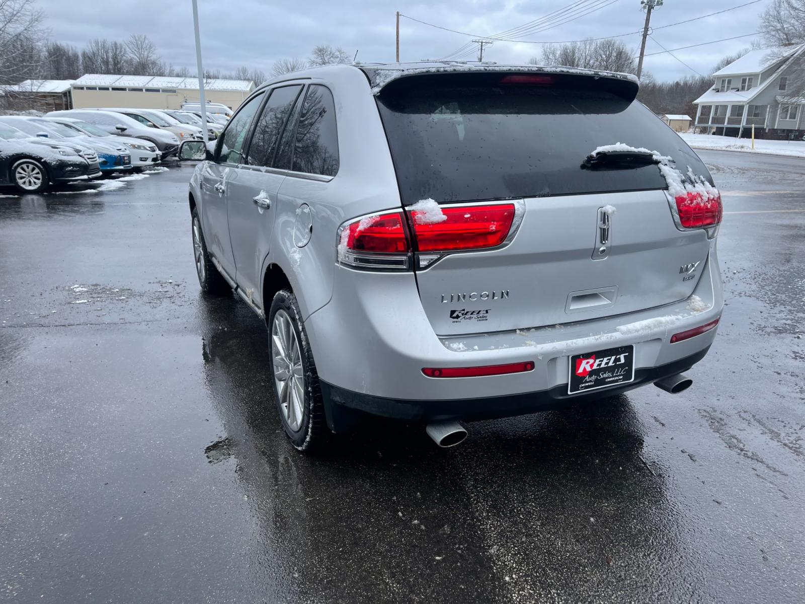 2014 Silver /Black Lincoln MKX Elite AWD (2LMDJ8JK4EB) with an 3.7L V6 DOHC 24V engine, 6-Speed Automatic transmission, located at 547 E. Main St., Orwell, OH, 44076, (440) 437-5893, 41.535435, -80.847855 - This 2014 Lincoln MKX AWD with the Elite Package offers a luxurious and well-appointed driving experience. Under the hood lies a robust 3.7-liter V6 engine mated to a smooth 6-speed transmission, delivering a balance of power and efficiency. Audiophiles will appreciate the premium THX audio system, - Photo #11